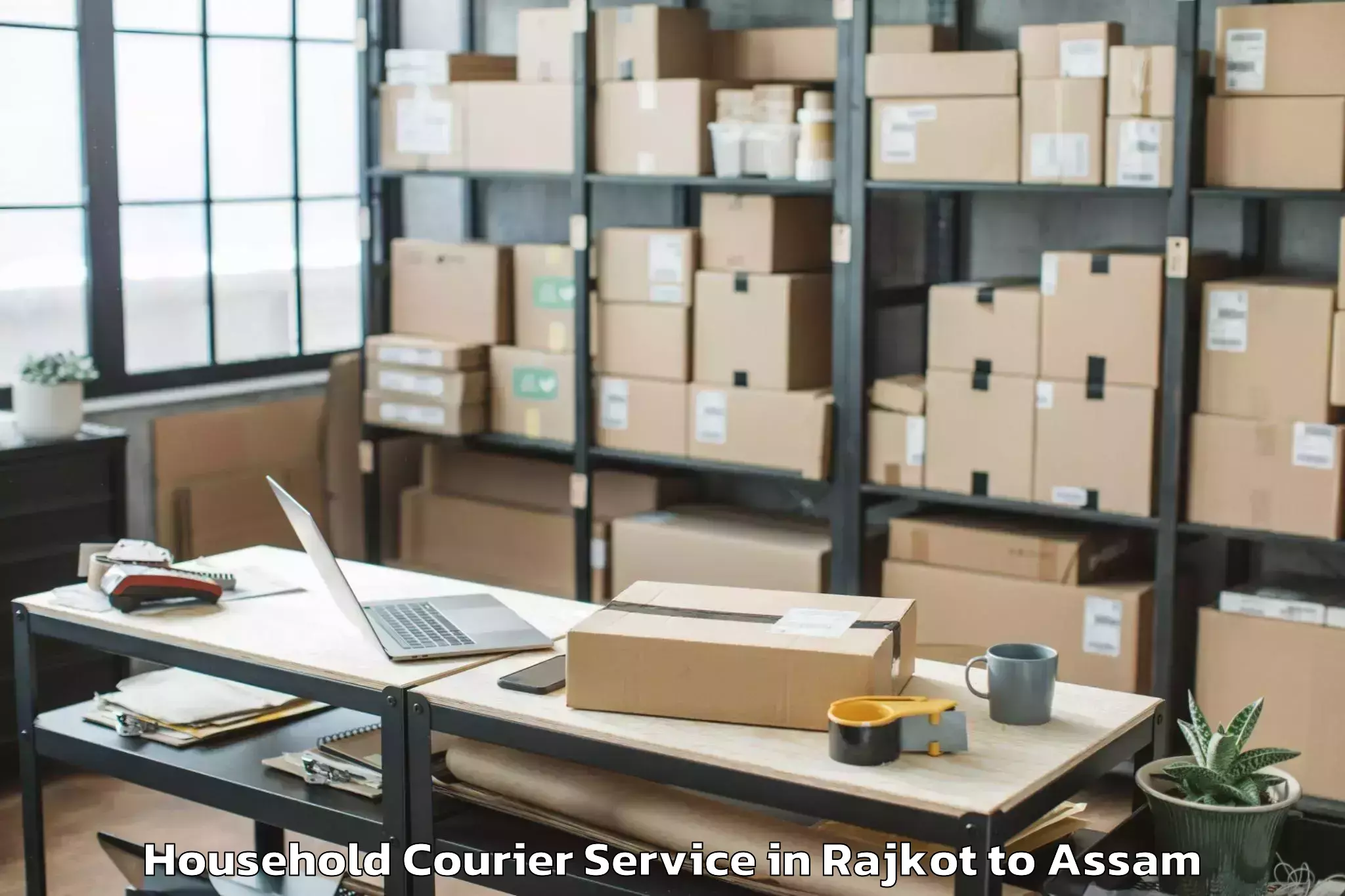 Rajkot to Dhakuakhana Pt Household Courier Booking